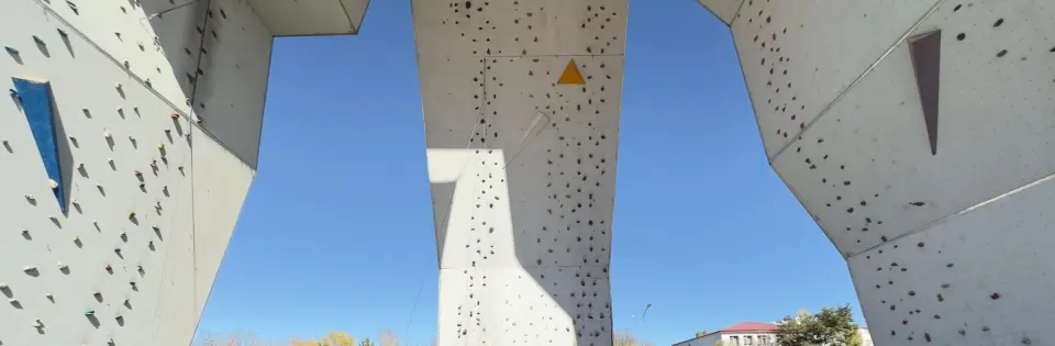 Looking up at the three climbing faces of the tower from its base