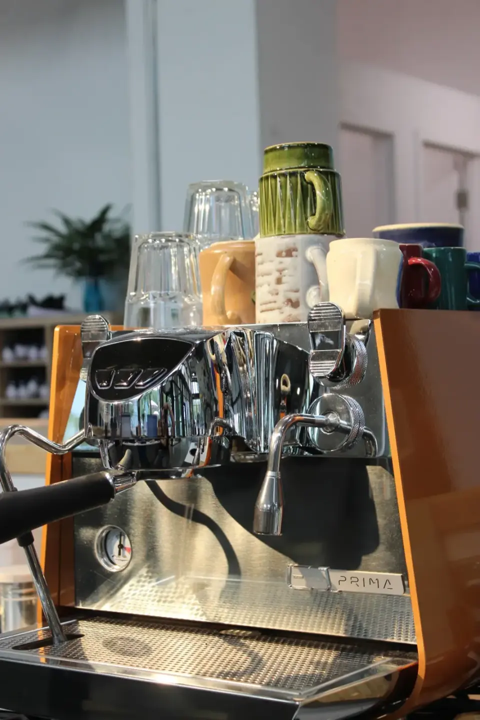 Espresso machine and mugs on the café counter