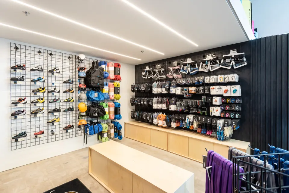 Climbing shop with walls of shoes, ropes, harnesses and quickdraws