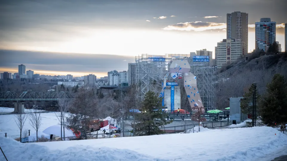 Climb YEG's outdoor climbing tower in Louise McKinney Riverfront Park, with downtown Edmonton behind