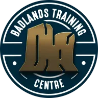 Badlands Training Centre logo: a round navy badge around a bronze rock formation