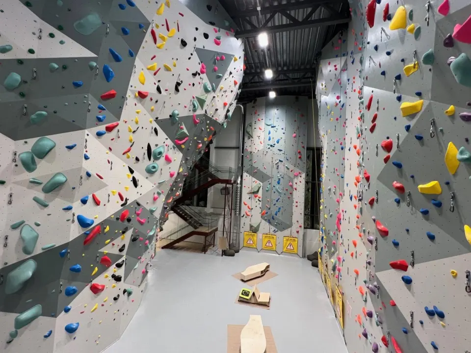 Tall rope walls and bouldering walls in the climbing hall at SiS Sportssenter, Stavanger