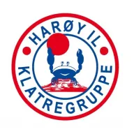 Round climbing group badge with a blue crab on a red rock