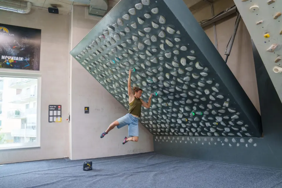 Climber on the Kilter Board