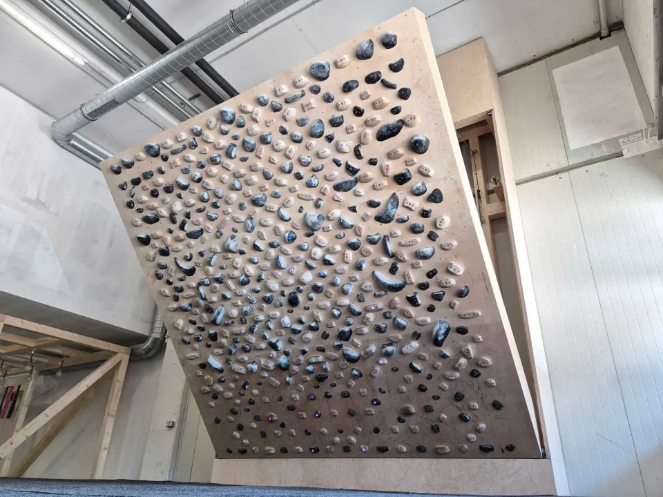 Tension Board covered in black and white holds