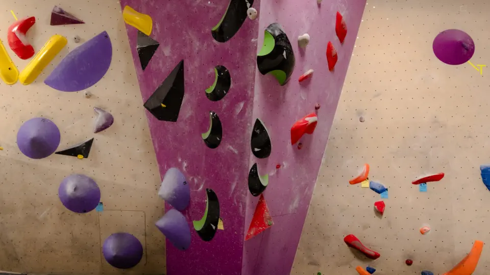 Purple pillar between bouldering walls set with red, yellow and purple holds