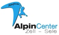 Alpin Center Zell-Sele logo with a blue Naturfreunde climber figure