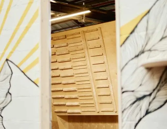 Wooden Güllich campus board in the training area