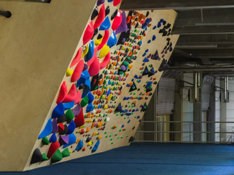 Overhanging spray wall densely covered in holds