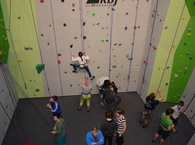 Climbers and belayers below the 11-metre roped wall, seen from above