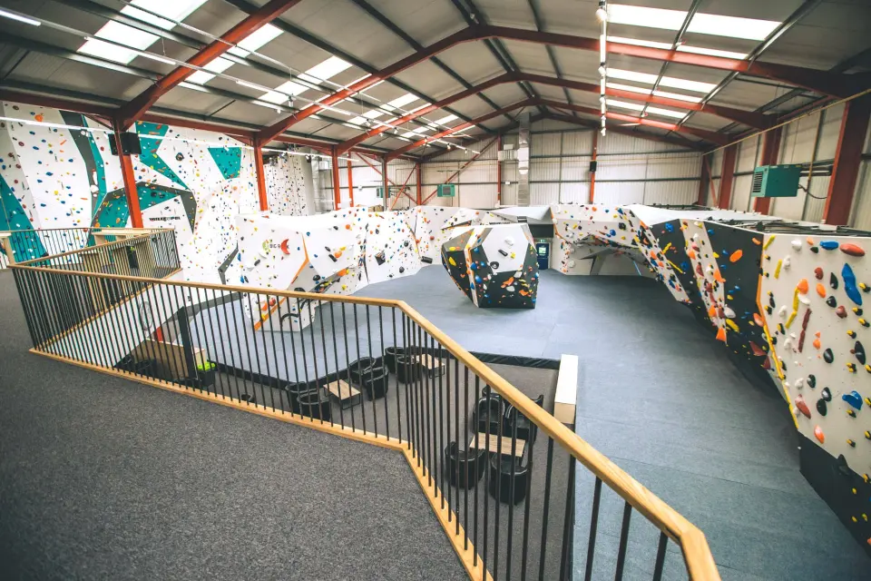 View over the open-plan bouldering area and freestanding boulder