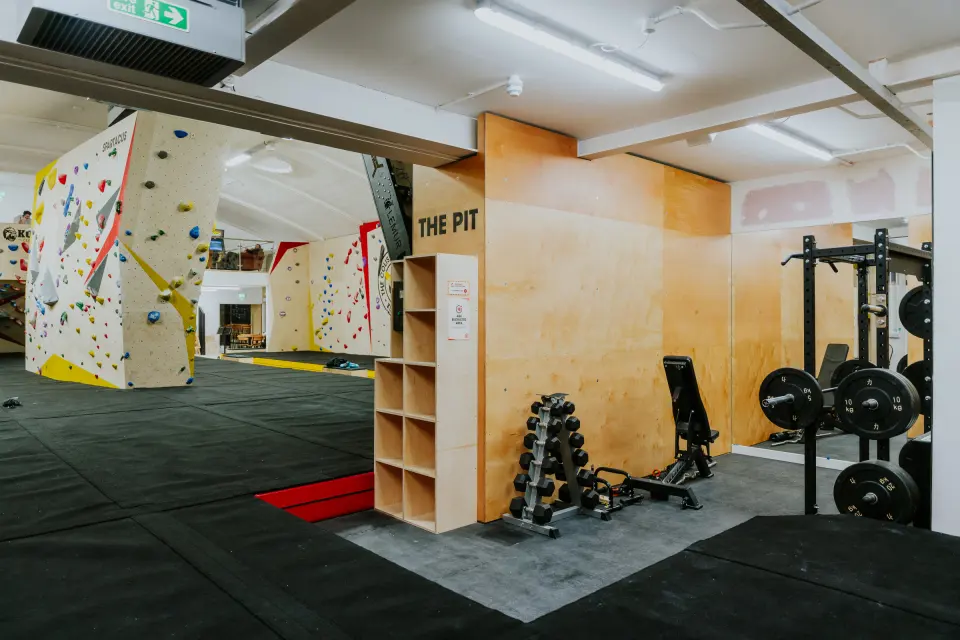 The Pit training zone with racks and free weights