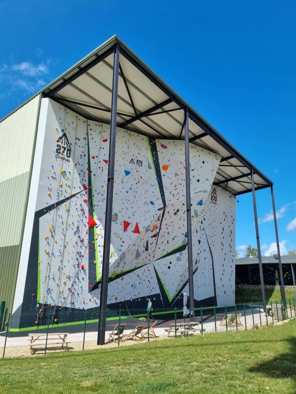 Covered outdoor lead wall on the side of the climbing hall