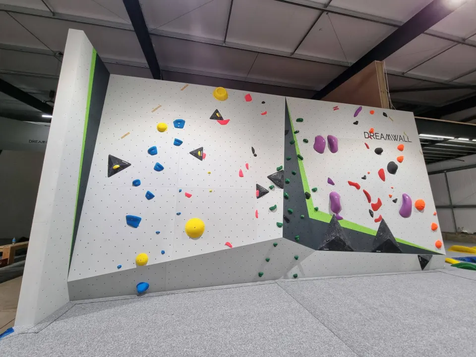 Angled bouldering wall with a slab and steep section
