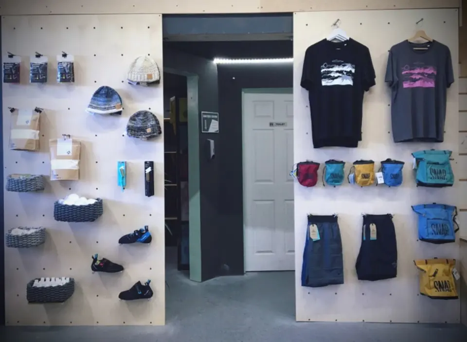 Climbing shop with shoes, chalk bags and T-shirts