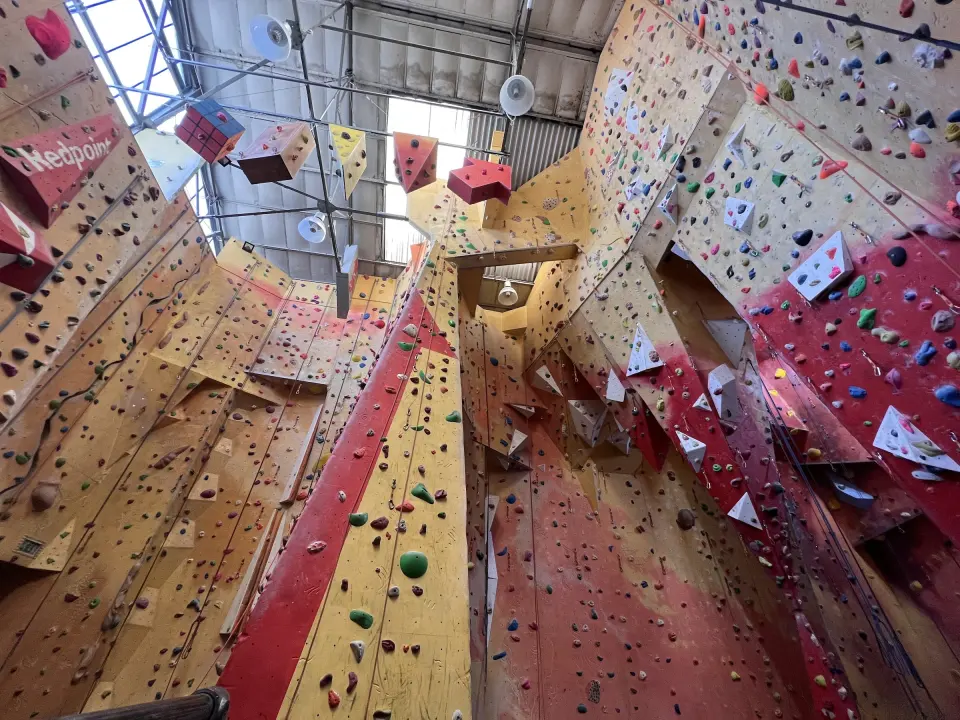 Looking up the tall walls towards the stalactite and bridges