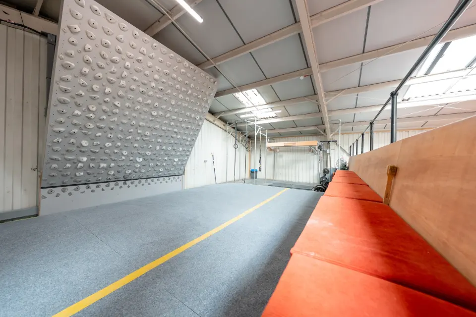 Training board wall beside the matted floor