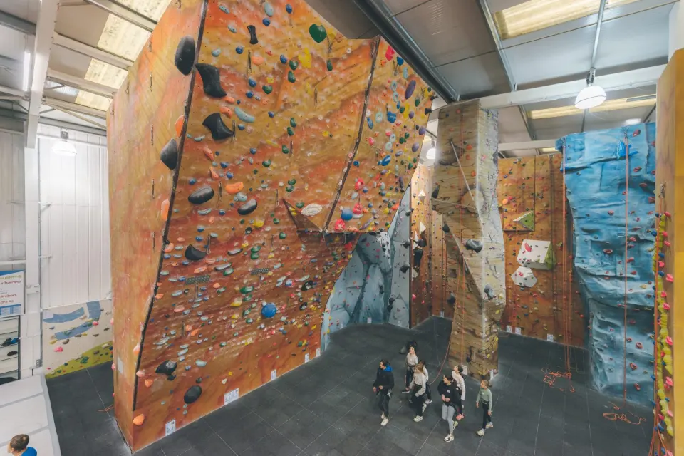 High view over the tall orange lead walls and blue rock-effect wall