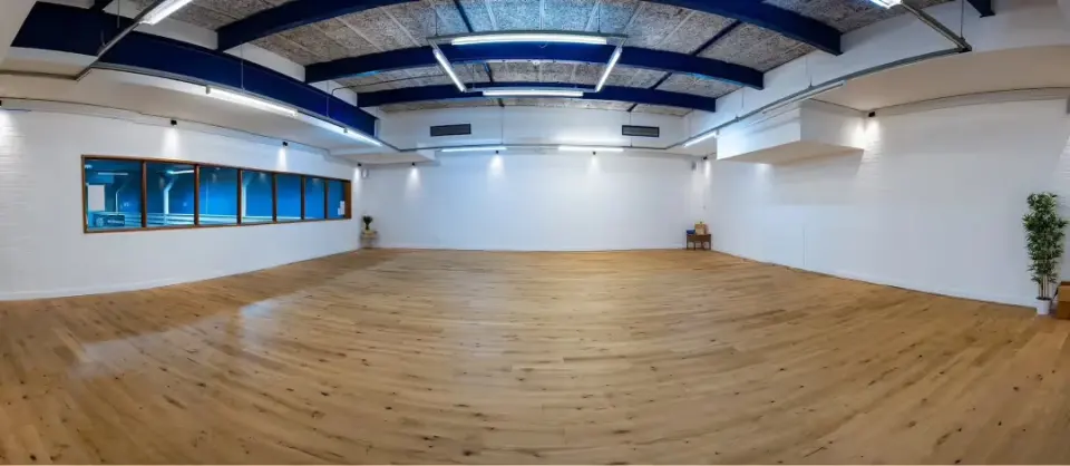 The yoga studio with its wooden floor
