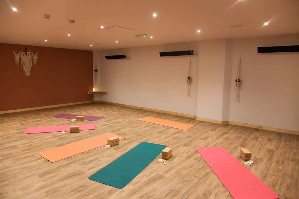 Yoga studio with mats and blocks laid out