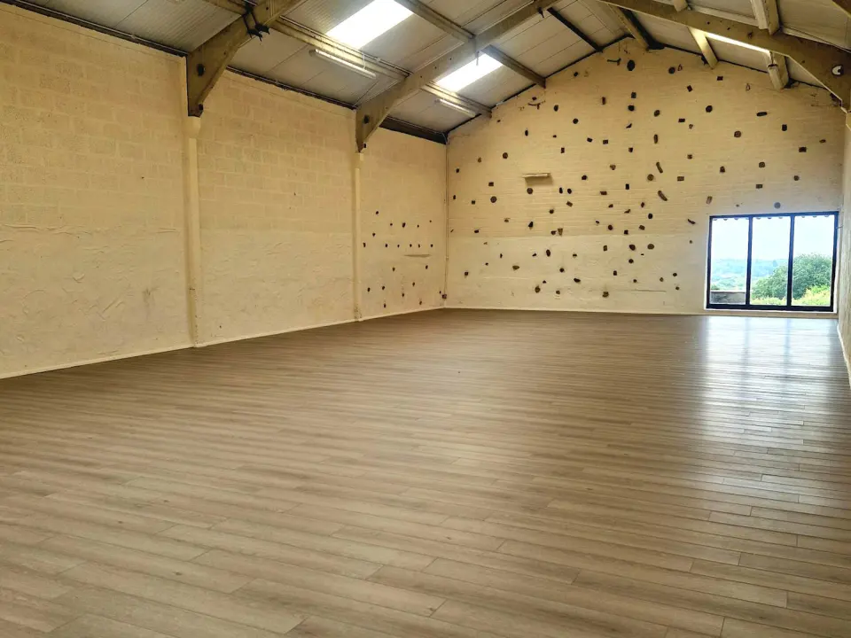 Activity Barn with climbing holds on the gable wall