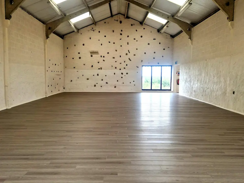 End wall of the Activity Barn fitted with climbing holds