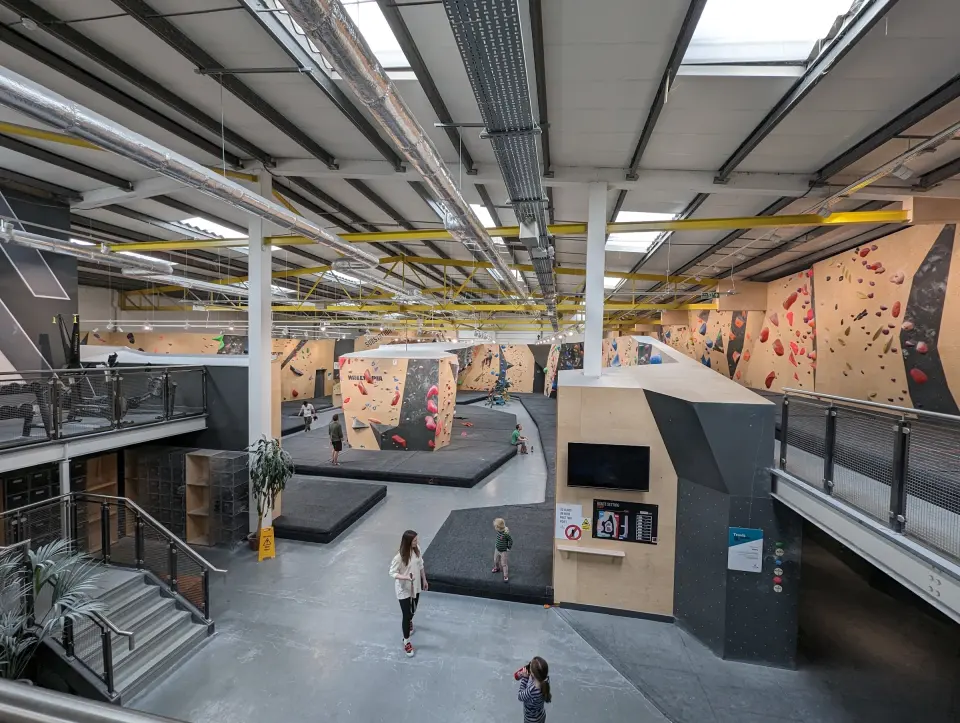 View along the bouldering hall from the mezzanine stairs