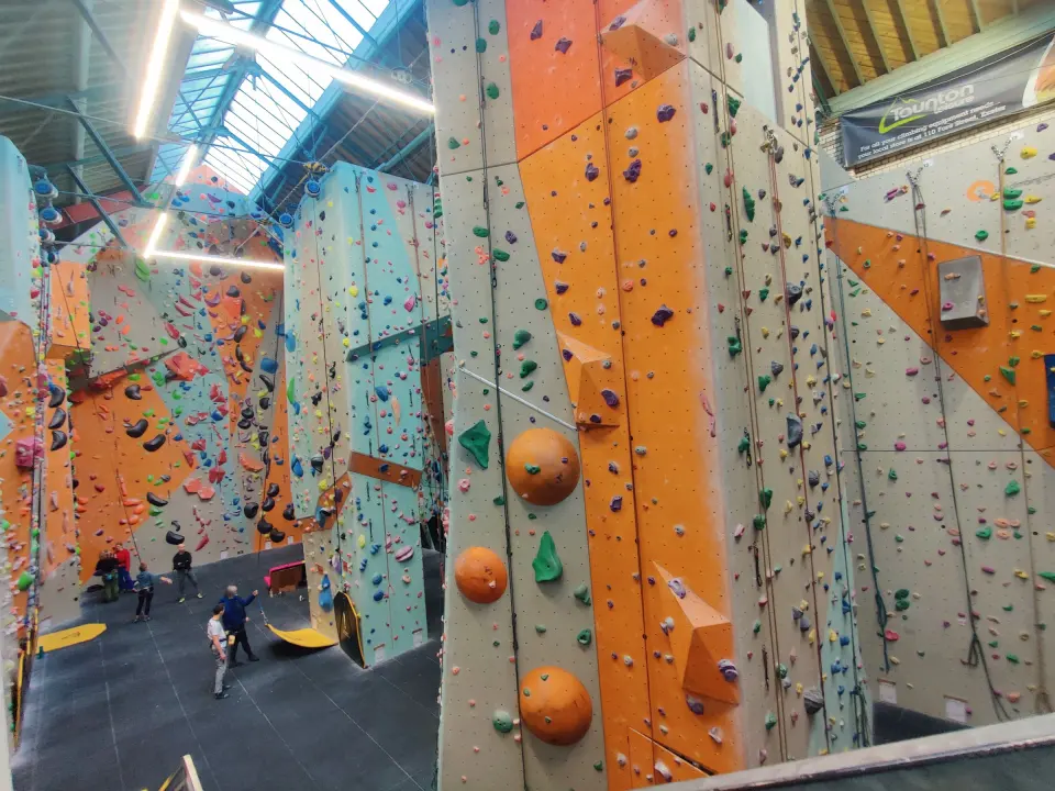Tall orange and pale blue rope walls in the main hall