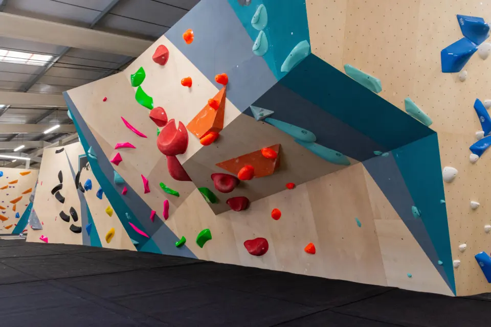 Overhanging wall with large red and orange holds