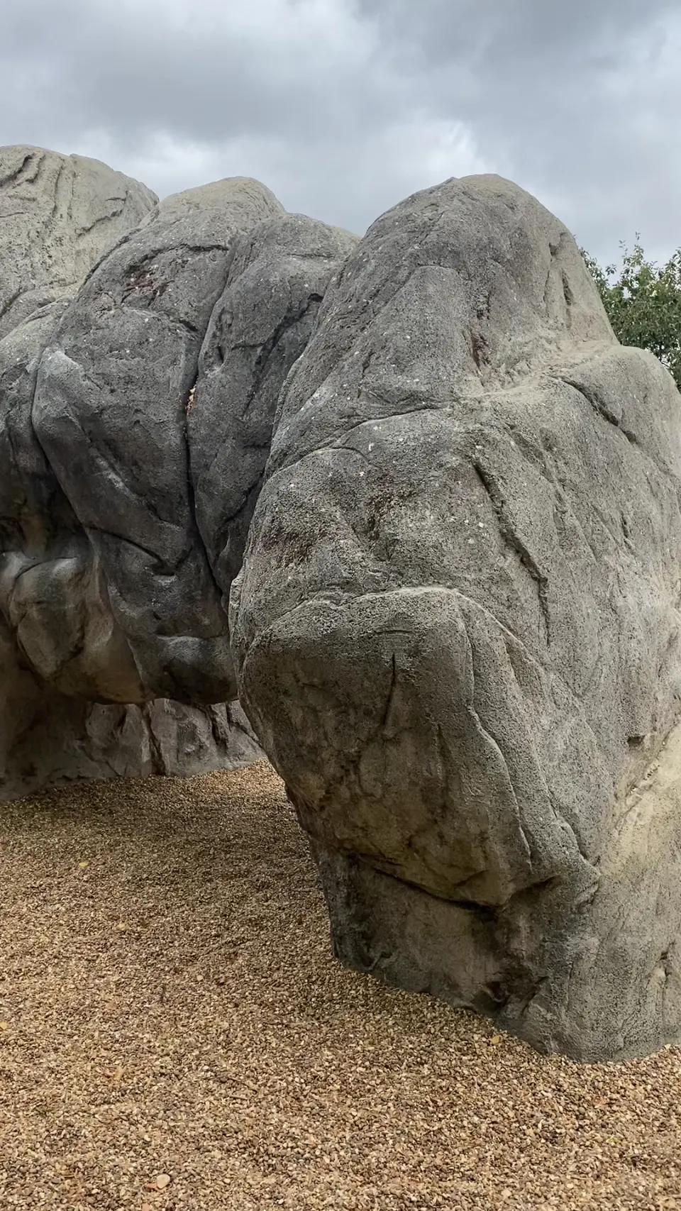 Rounded sculpted boulder with an overhanging base