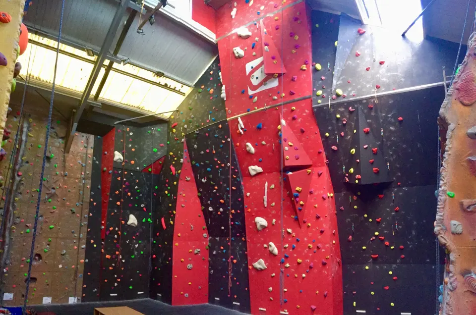 Red and black roped climbing walls with top ropes at Creation Climbing Centre in Birmingham