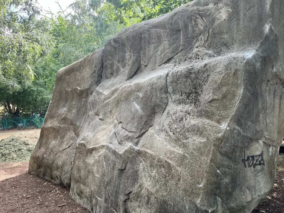 Long face of the boulder with small edges and slopers