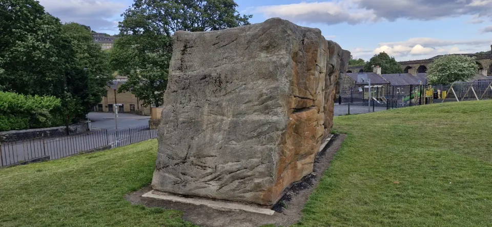 End wall of the boulder, with the playground behind