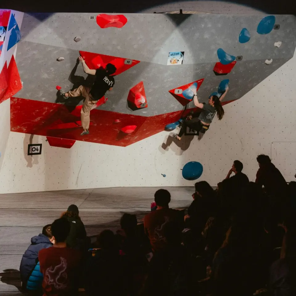 Spectators watching a competition final on an overhang