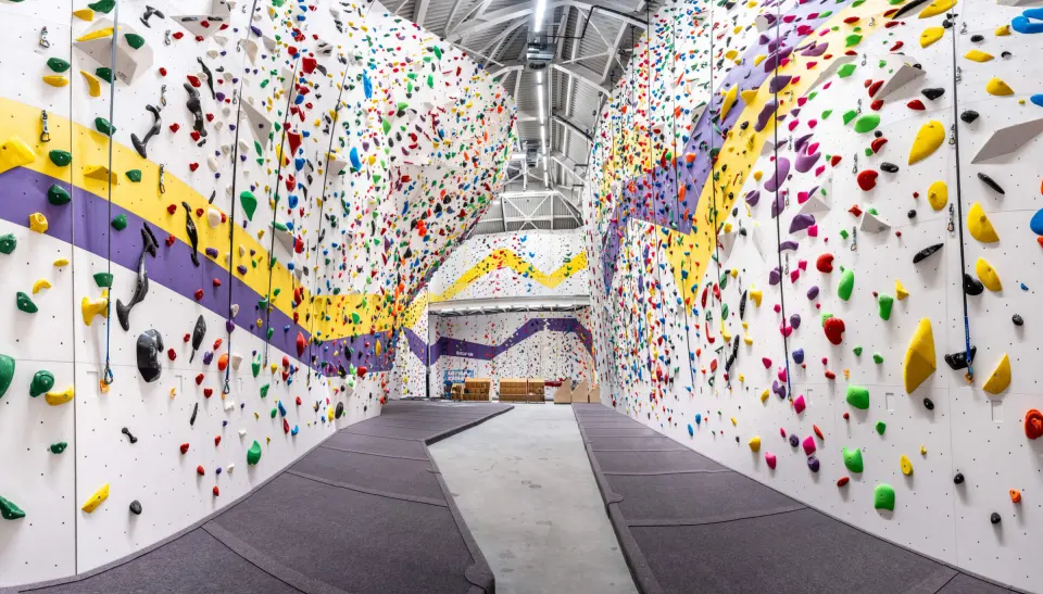 Tall roped climbing walls inside Balkan Climbing in Sofia