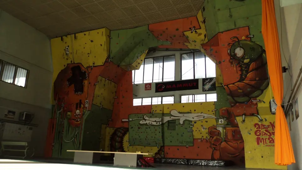 Painted climbing towers and bouldering wall inside Stara Zagora sports hall