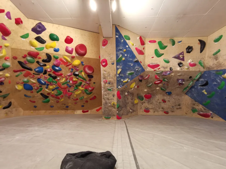 TNT’s angled bouldering panels and padded floor