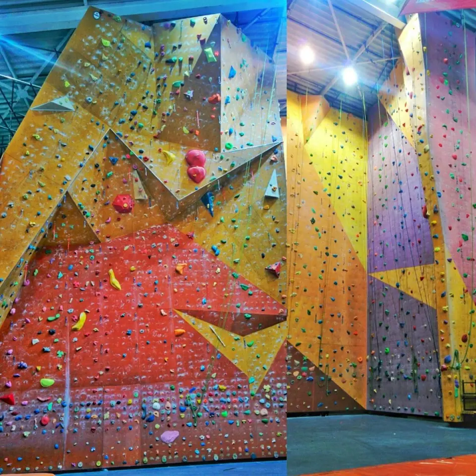 Roped walls and overhangs inside the NSA climbing hall