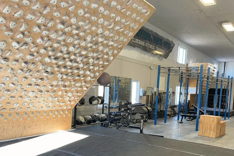 Kilter Board beside the weights area