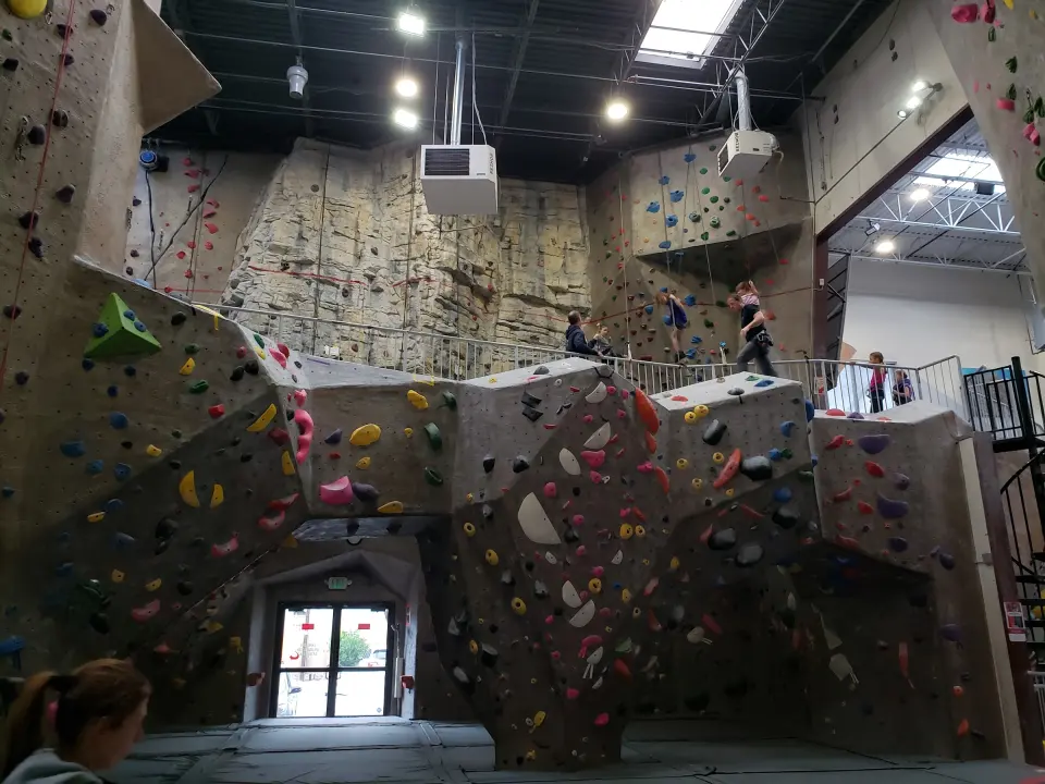 Bouldering walls below the mezzanine over the entrance