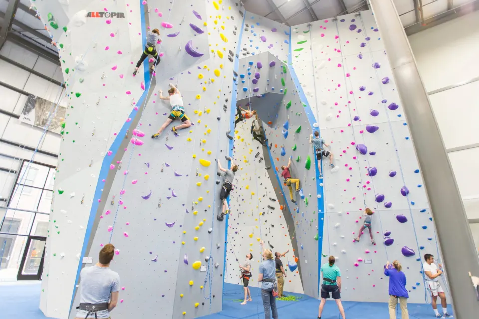 Climbers on the tall top-rope and lead walls