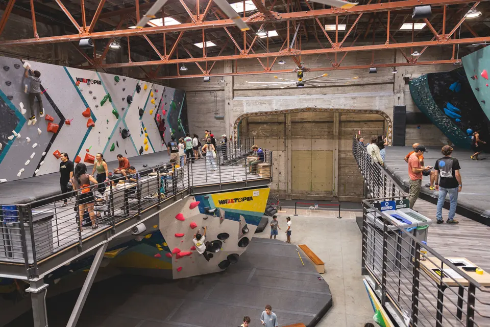 Bouldering walls and mezzanine in front of the old theatre's proscenium arch