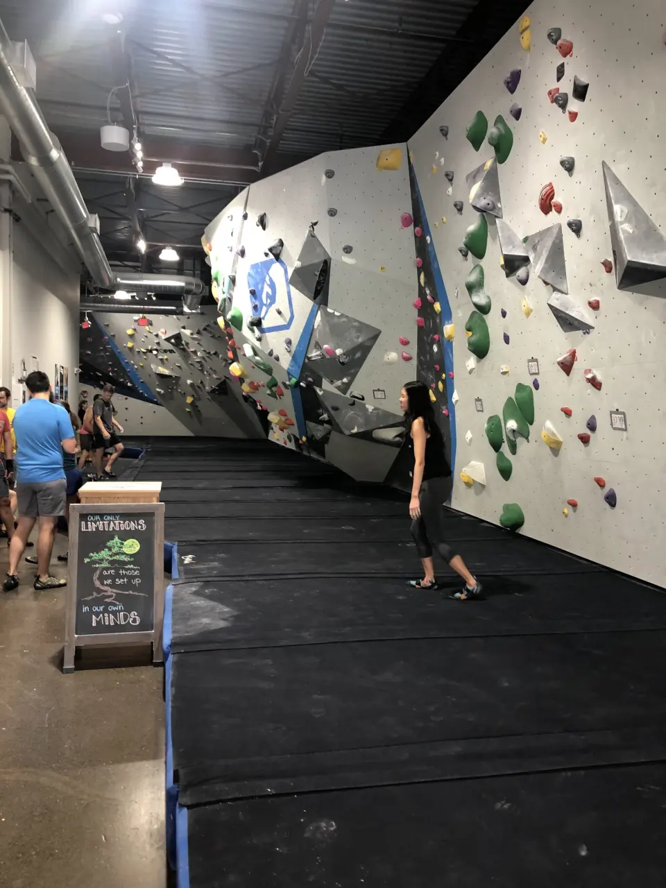 Matted bouldering corridor between the walls