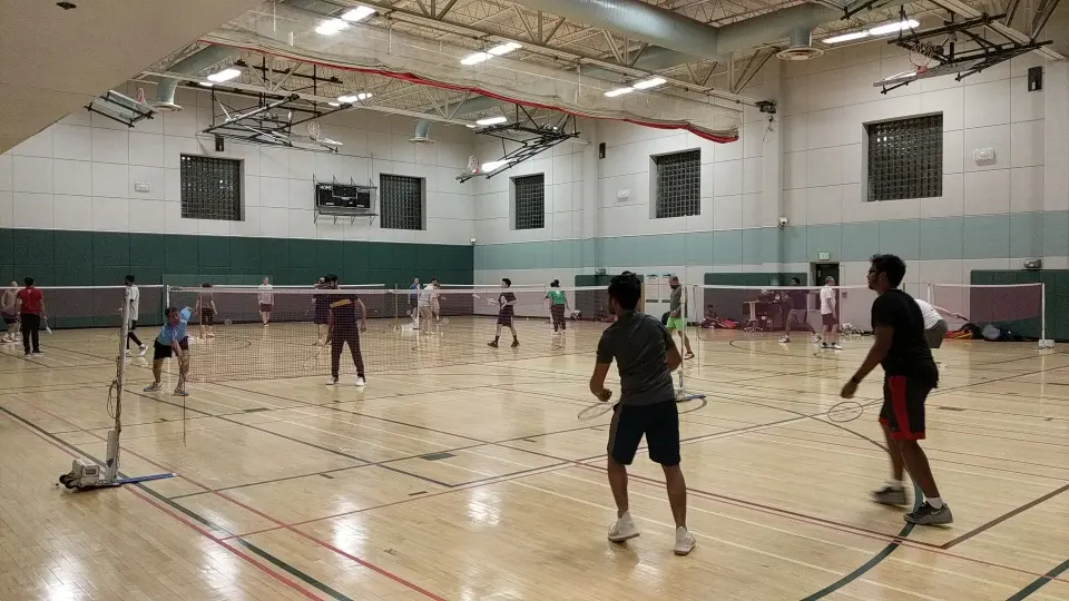 Badminton players in the centre's full-sized gymnasium