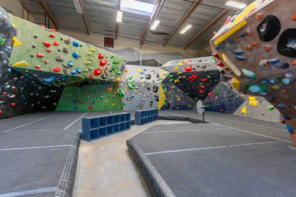 Main bouldering hall with the green roof section on the left