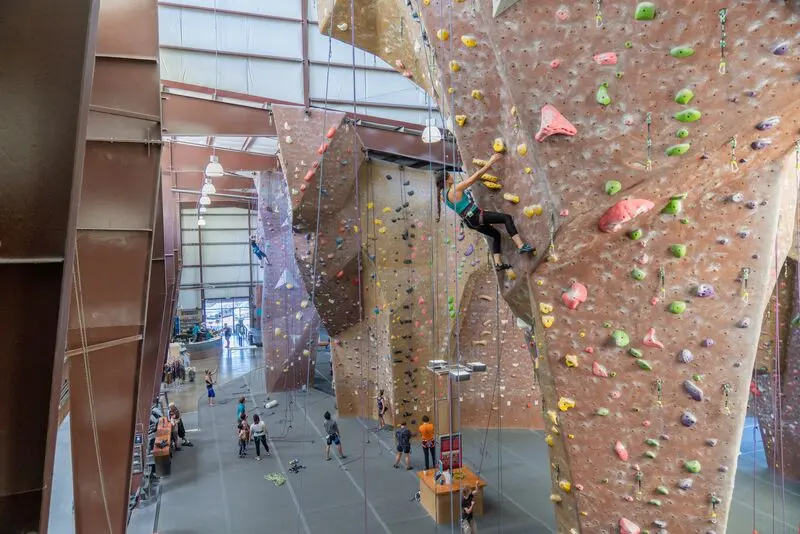 Looking down the rope walls from above, with climbers on the routes