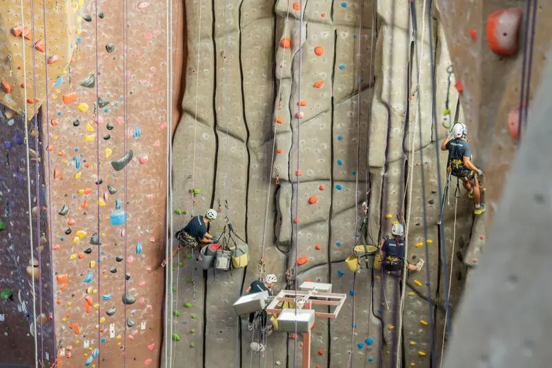 Route setters at work on the crack climbing wall