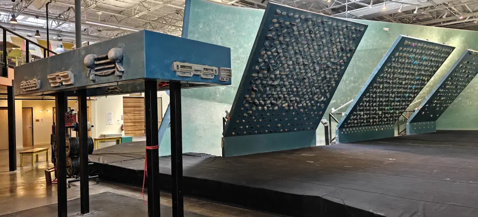 Training centre with hangboard rig and steep system boards