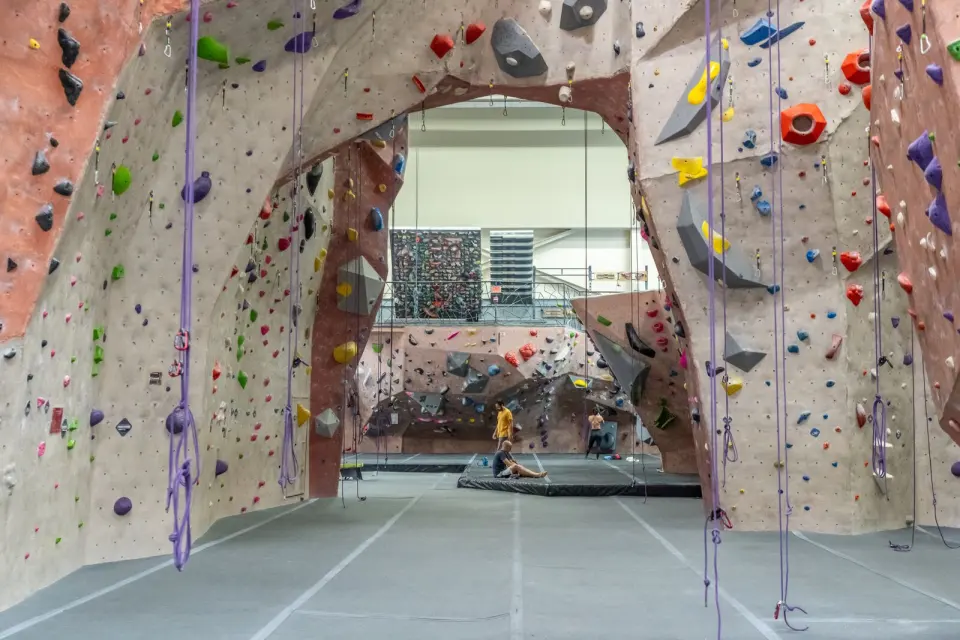 View through an arch in the rope walls towards the bouldering area