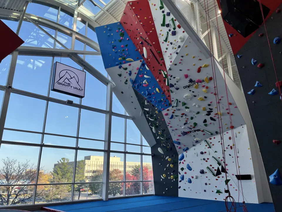 Top-rope walls beside the glass atrium windows